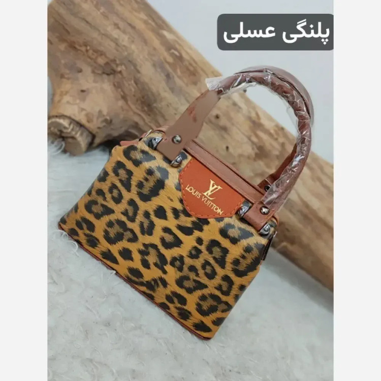 کیف مجلسی مدل صدف چرم صنعتی ابعاد 22 در 18 رنگ بندی متنوع