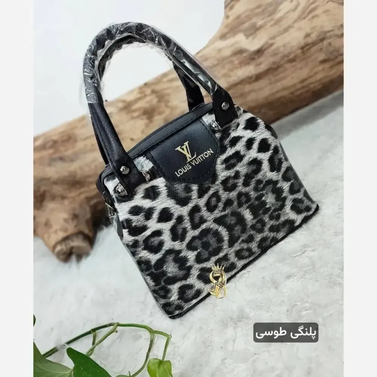 کیف مجلسی مدل صدف چرم صنعتی ابعاد 22 در 18