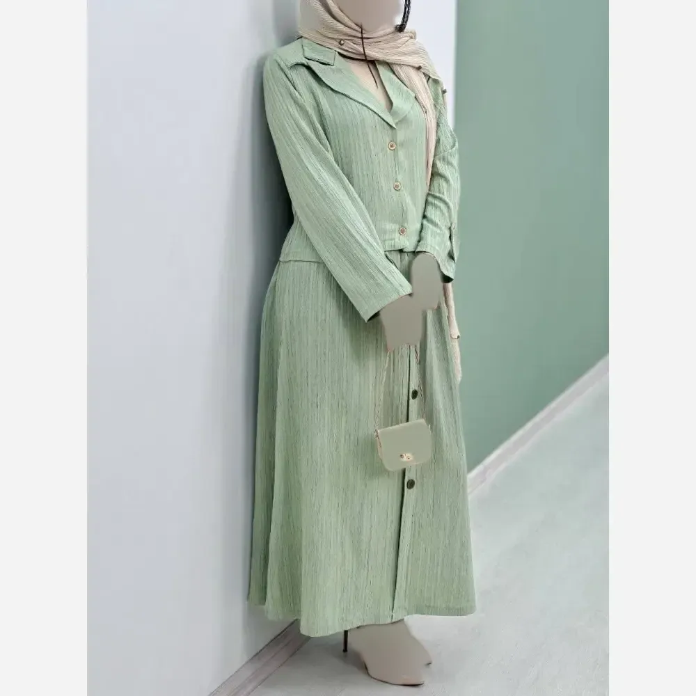 مانتو لوسی شانتون سبک و خنک فری سایز 38 تا 46 در چهار رنگ نسکافه ای کرم سبز کرم نسکافه ای قد 122 سانت آستین گت کمربند دارد
