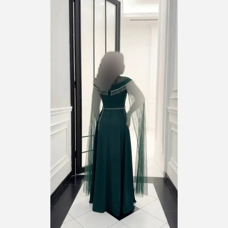 پیراهن ماکسی زنانه فرشته فرمالیته با نگین دی ام سی و ریسه سایزبندی 38 تا 48 جنس کرپ دالقیچ گرم بالا