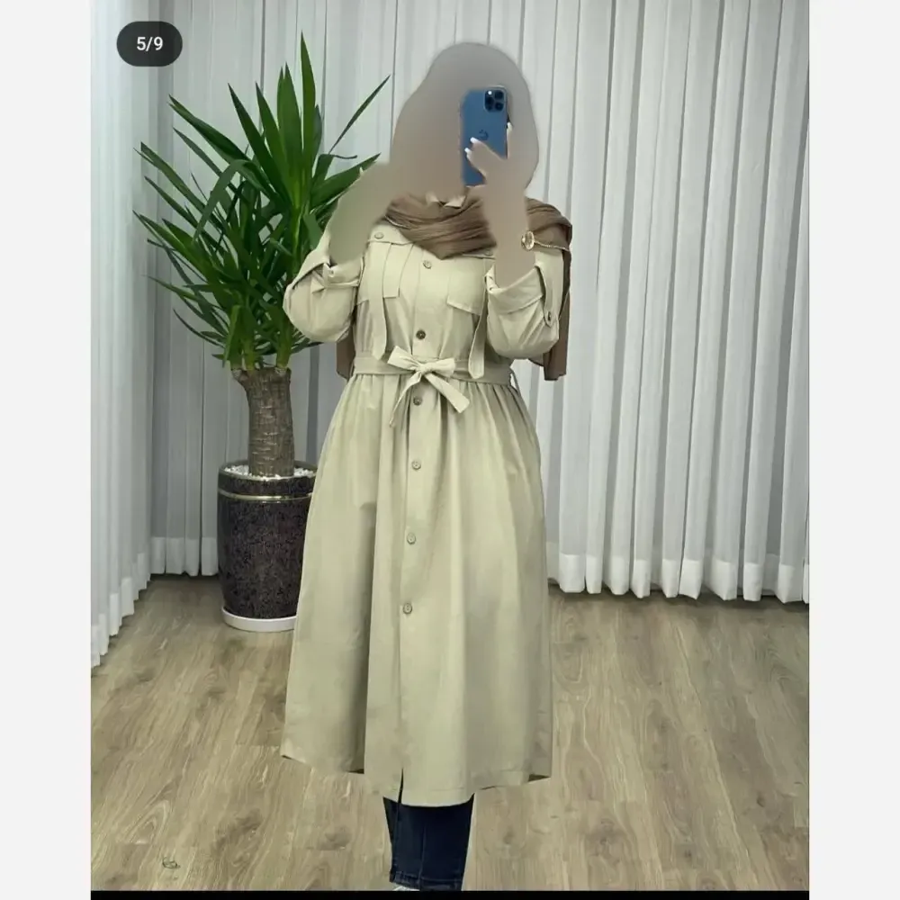 مانتو لینن ترک بلند زنانه مدل هاریکا با جیب و کمربند