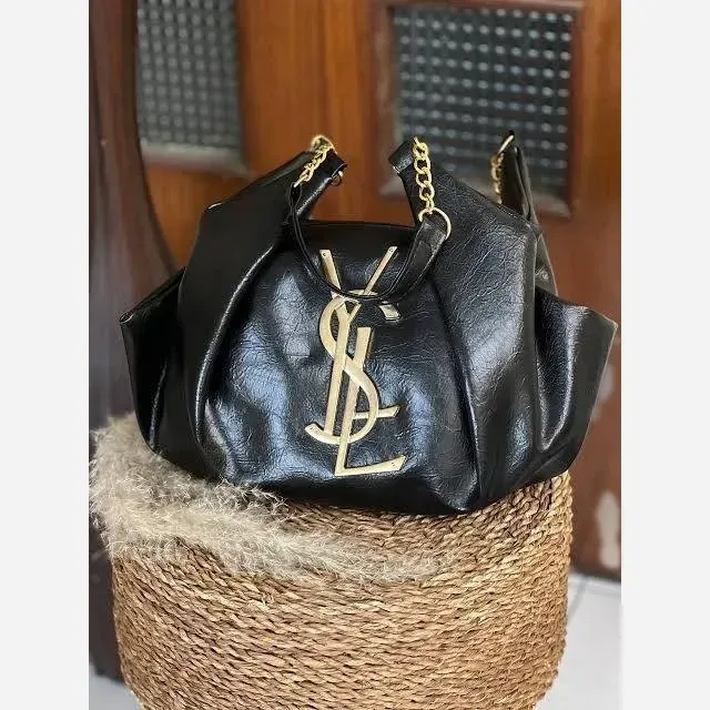 کیف چرم یاشیل طلایی سایز آزاد 50*25 سانتیمتر