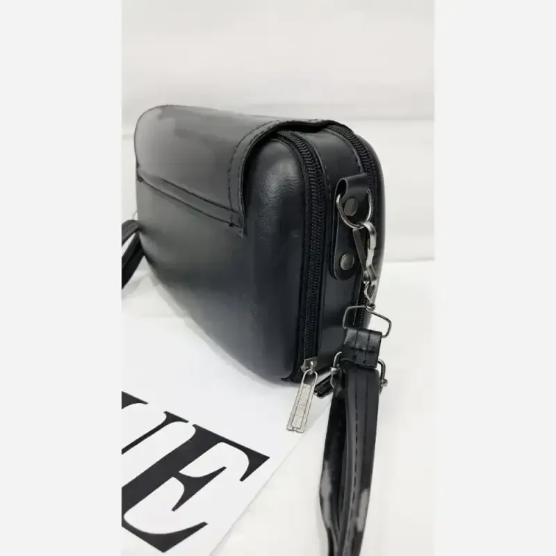 کیف دوشی چرم زنانه مشکی سایز 15 در 20 دارای بند بلند