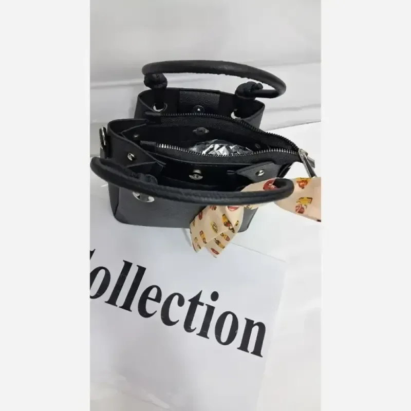 کیف دستی دوشی چرم مشکی سایز 18 در 18 با بند بلند