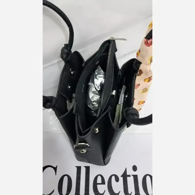 کیف دستی دوشی چرم مشکی سایز 18 در 18 با بند بلند