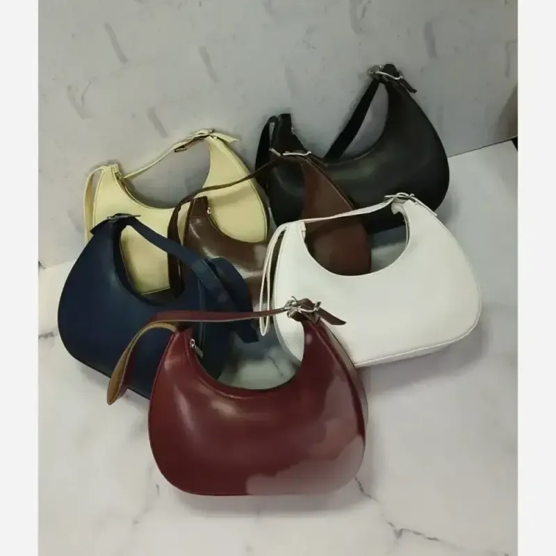 کیف چرمی پینترسی زنانه ابعاد 15 در 20 رنگ مشکی شکلاتی سرمه ای